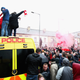 Illustration for article titled Liverpool Fans Get Rowdy, Hop On Police Vans